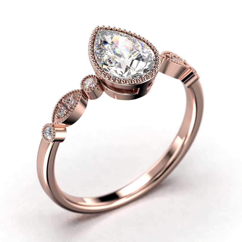 1.25 Carat Pear Cut Moissanite Engagement Ring in 925 Sterling Silver With 18k Rose Gold Plating D6763